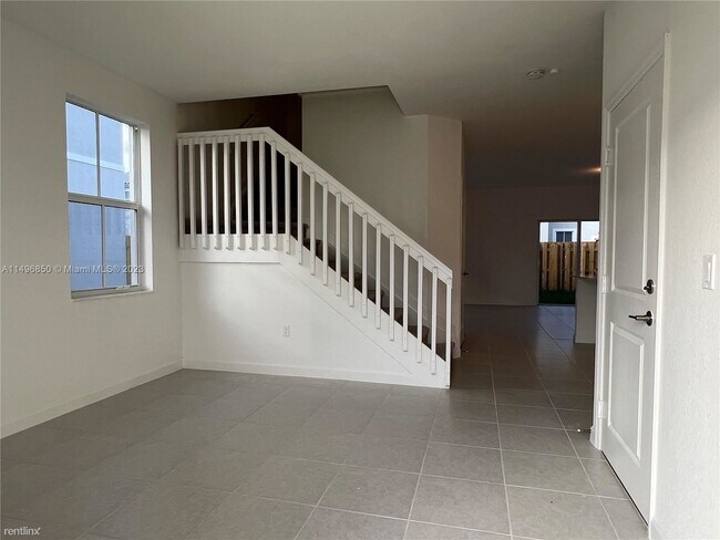 Building Photo - 4 br, 2.5 bath House - 11837 NW 46th St # 1