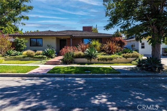 Building Photo - 5220 E Los Flores St