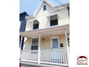 Building Photo - 115 E 6th St