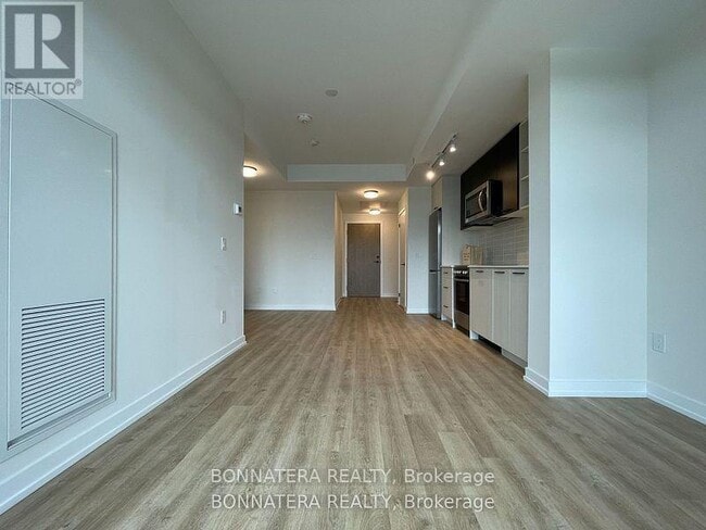 Building Photo - 2306-2306 St Clair Ave W