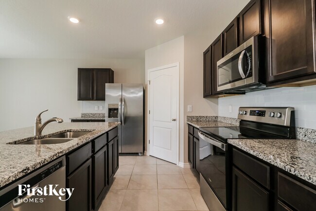 Building Photo - 5876 Arlington River Dr.