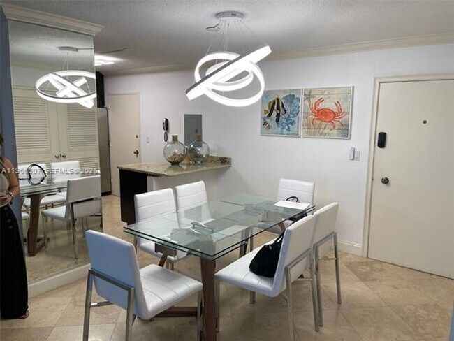 Building Photo - 5555 Collins Ave