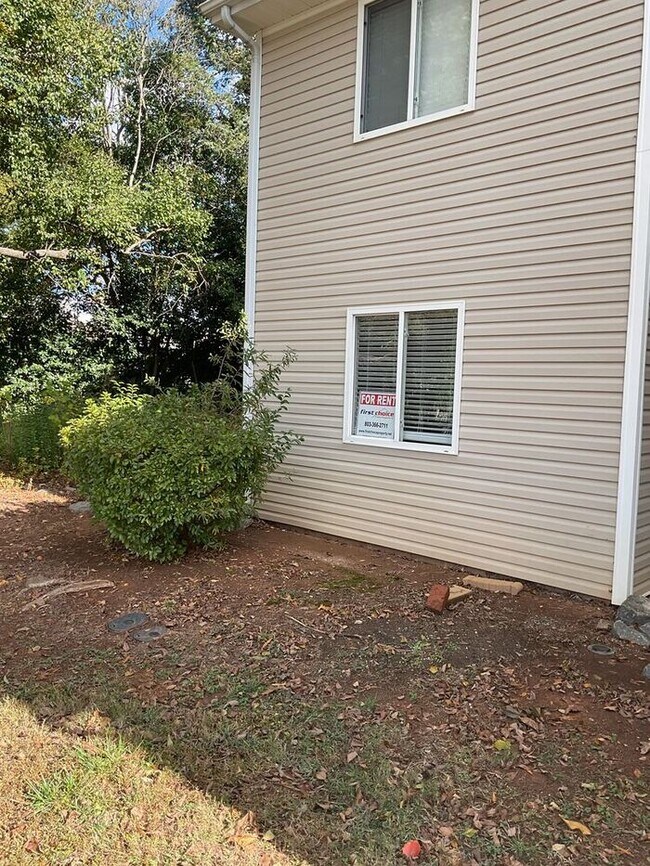 Building Photo - Just off the main road, but in walking dis...