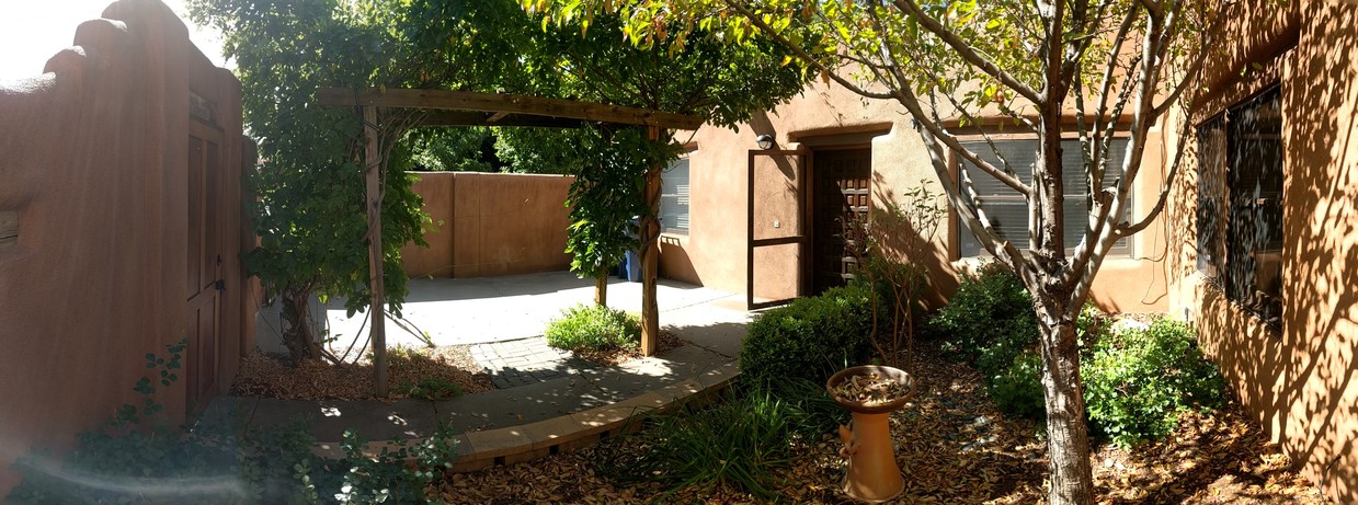 Front yard with enclosed parking - 985 Agua Fria St