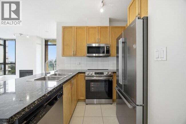 Photo du bâtiment - 6823 Station Hill Dr