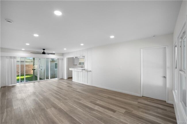 Building Photo - Welcome to this inviting 3 bedroom, 2 bath residence tucked away on a peaceful street in the hear...