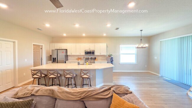 Building Photo - BRILLIANT 4 BEDROOM/2.5 BATH HOME AVAILABLE IN AVIARY at RUTLAND RANCH PARRISH!