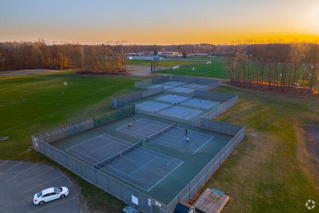 Practice on the tennis courts and soccer fields at Clifton Park's Shenendehowa High School.