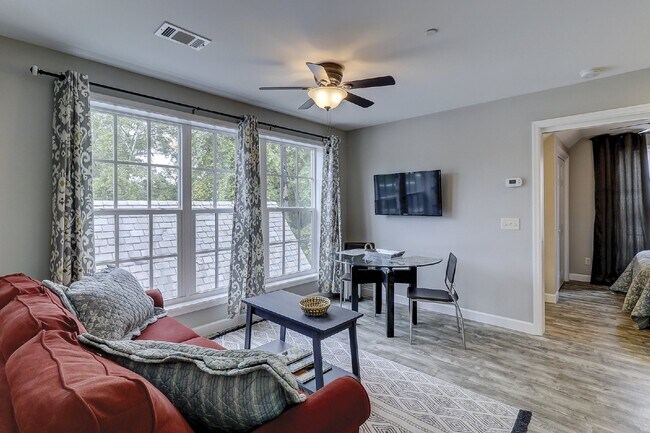 Building Photo - Modern, Furnished (or unfurnished), One Be...