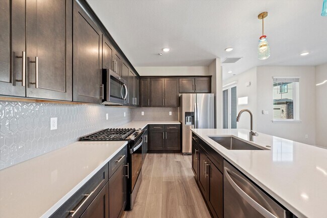 Building Photo - Stunning new-construction home in Aurora, CO, where modern design meets everyday comfort.