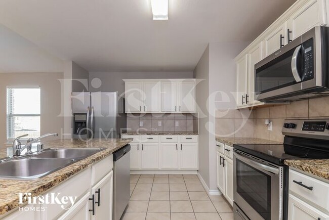 Building Photo - 1115 Riverstone Trl