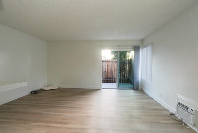 1 bedroom living room-renovated - Anaheim Cottages