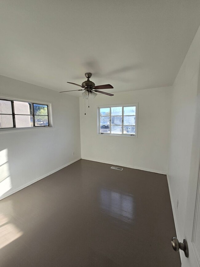 Building Photo - Centrally located in the NE Heights 4 bedroom, 1 3/4 Bath 1900 square feet
