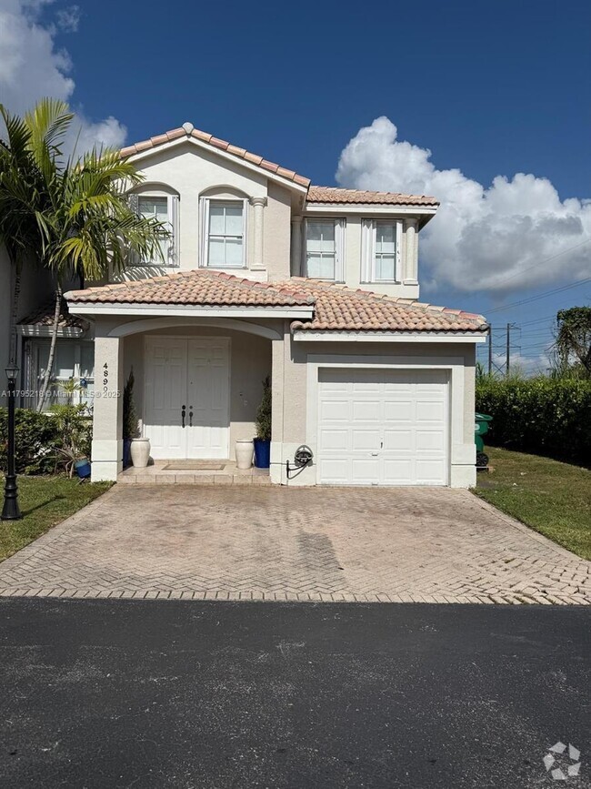 Building Photo - 4890 NW 108th Pl