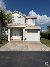Building Photo - 4890 NW 108th Pl