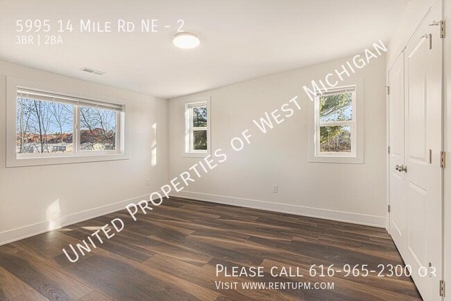 Building Photo - 5995 14 Mile Rd NE