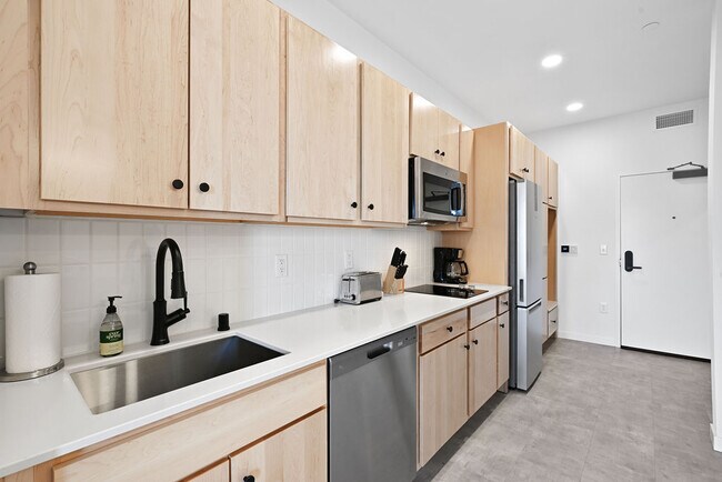 Building Photo - The Common Place Apartments