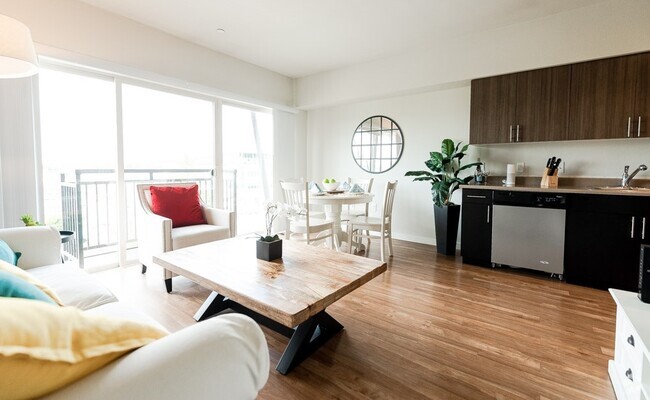 Kent Apartments - The Platform Apartments - Living Room, Dining Room, Kitchen, and Deck - The Platform