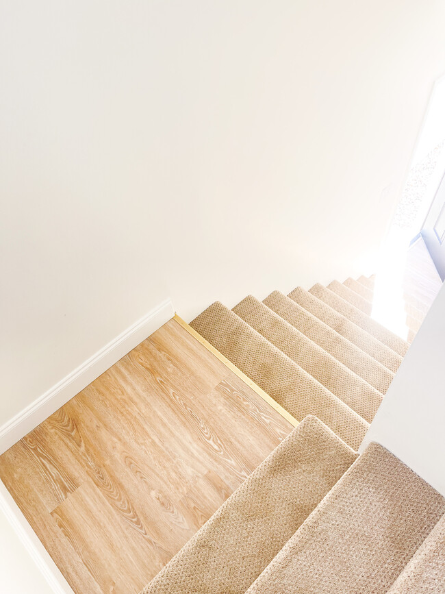 Stairs leading to the main living area - 1015 S Kentucky Ave