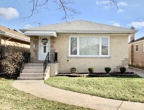 Building Photo - 4721 N Ozanam Ave