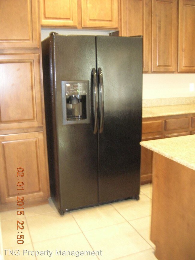 Foto del edificio - 6721 Bluebell Garden St