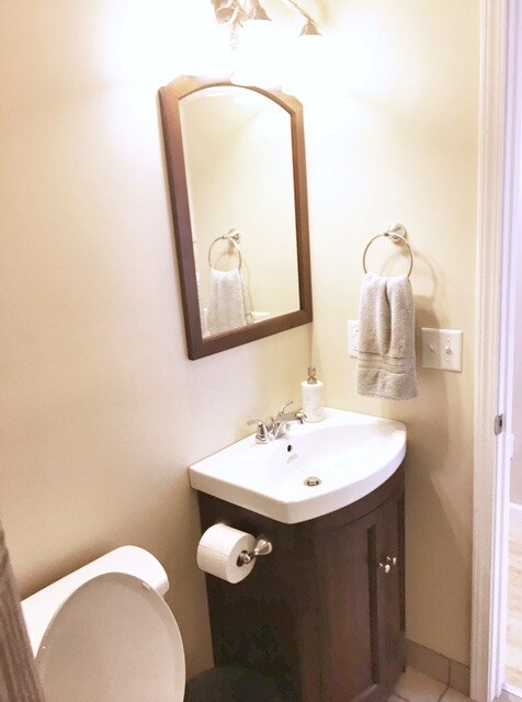 Bathroom with cherry cabinet/mirro - 1918 7th Ave
