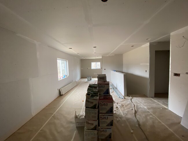 Main living area with kitchen in the back - 3628 Green Ave