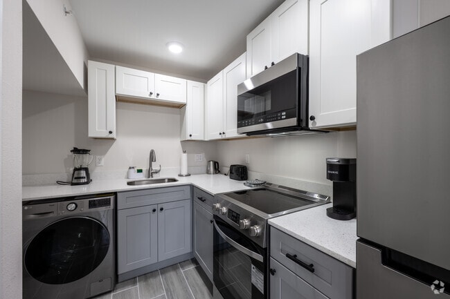 1 habitación, 1 baño - 600 pies cuadrados - Cocina - Beachside Palms @ Daytona Beach