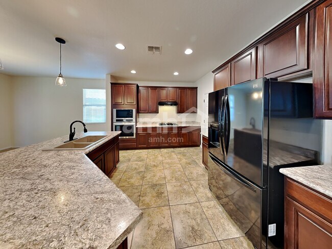 Building Photo - 12119 W Range Mule Dr