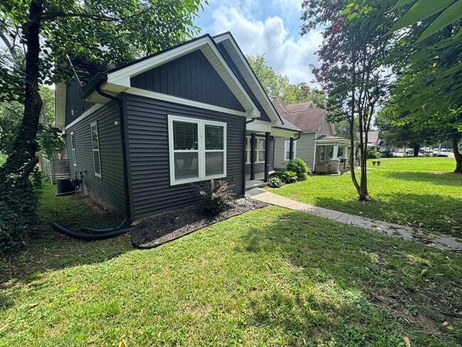 Photo - Modern Bungalow Charm: Designer Finishes & Expansive Backyard Living! House