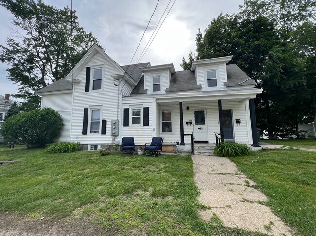 View from Beacon St and main entrance (left door) - 514 Amherst St