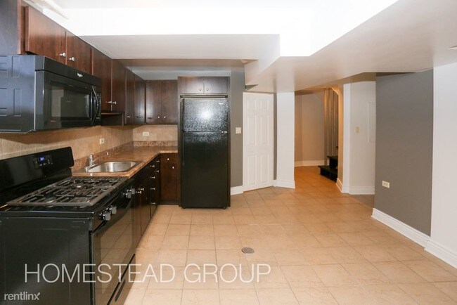 Foto del edificio - 4708 N Lowell Ave