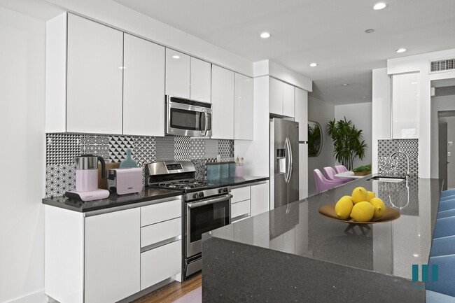 Kitchen with Stainless-Steel Appliances - Kelton Alexander