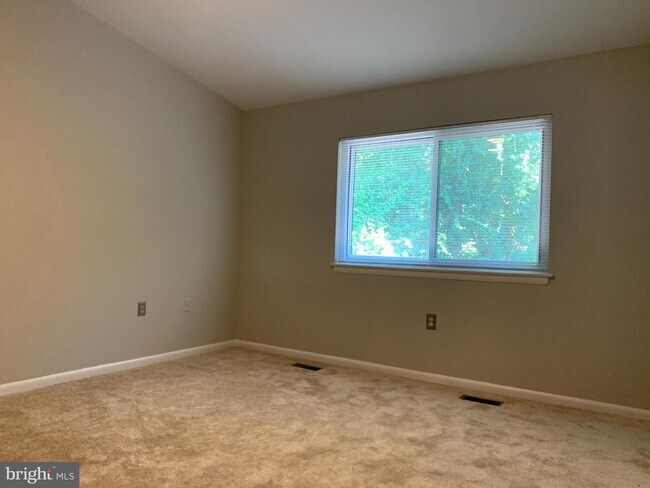 Building Photo - 8103 Greenspring Way
