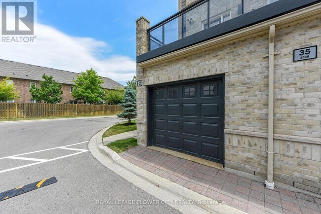 Building Photo - 5035-5035 Oscar Peterson Blvd