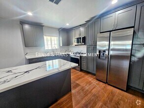 Building Photo - 1551 W 103rd St