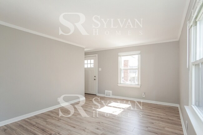 Foto del edificio - This home exudes a cheerful and welcoming charm!