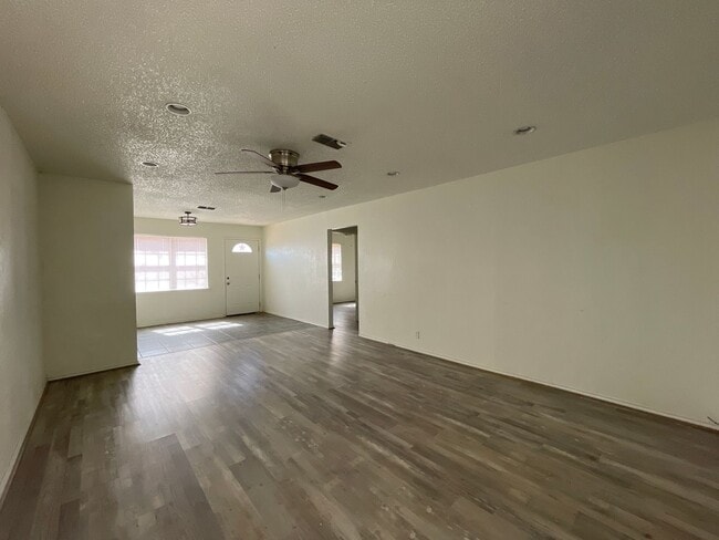 Building Photo - Three bedroom two bath house available in ...