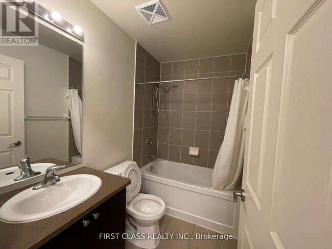 Photo du bâtiment - 339-1339 Rathburn Rd W