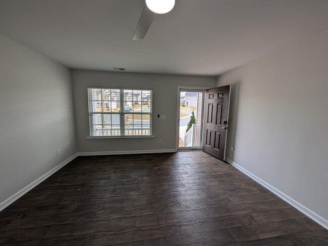 Living room facing outside. - 1682 Weatherend Dr