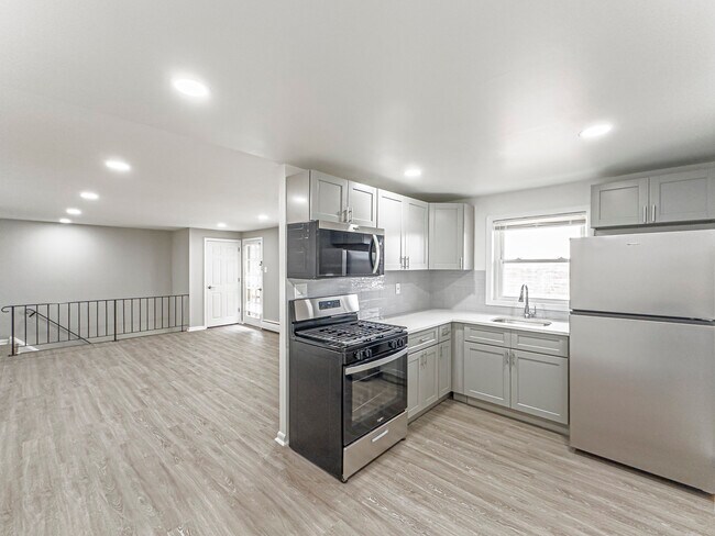 Cocina / Sala de estar - Hamilton Court Apartments