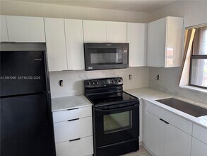 Building Photo - 6465 W 27th Ave