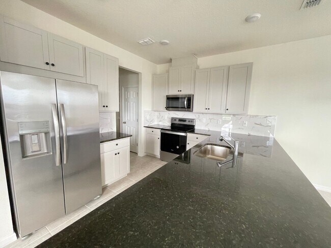 Building Photo - Brand New, Water View, Luxury Executive 3 ...