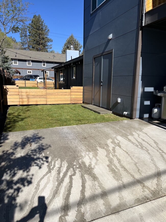 designated parking spot, lawn area and gear closet - 830 NW 12th St