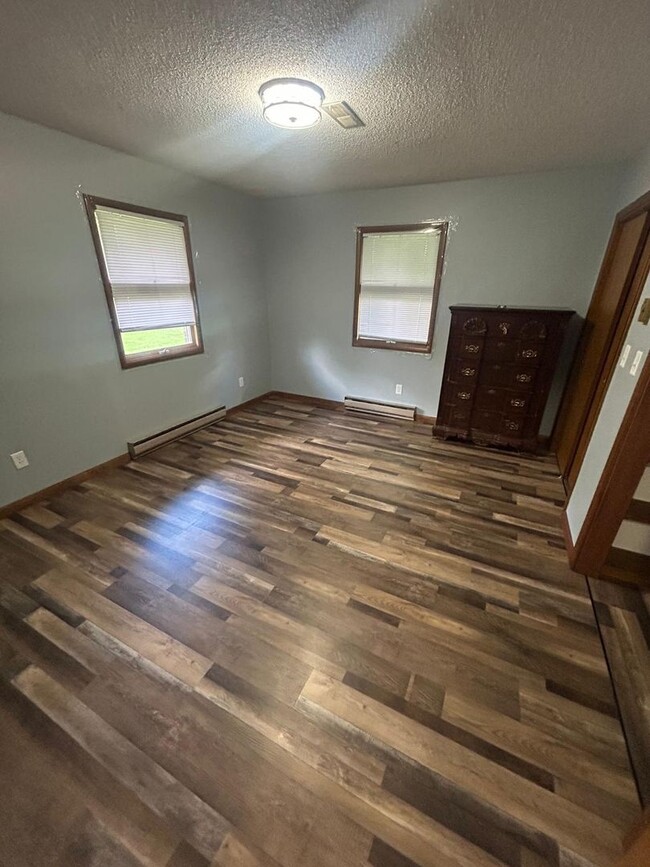 Building Photo - Updated 2BR, 1BA Brick Unit with Garage in...
