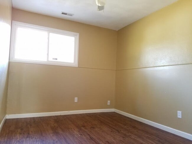 Building Photo - 8507 RED FIR DRIVE