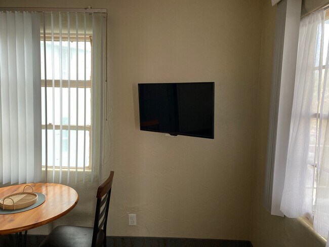 wall mounted flat screen - 2125 S Atlantic Ave