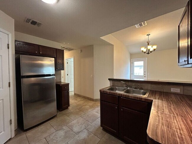Building Photo - 1007 Trail Driver Cove