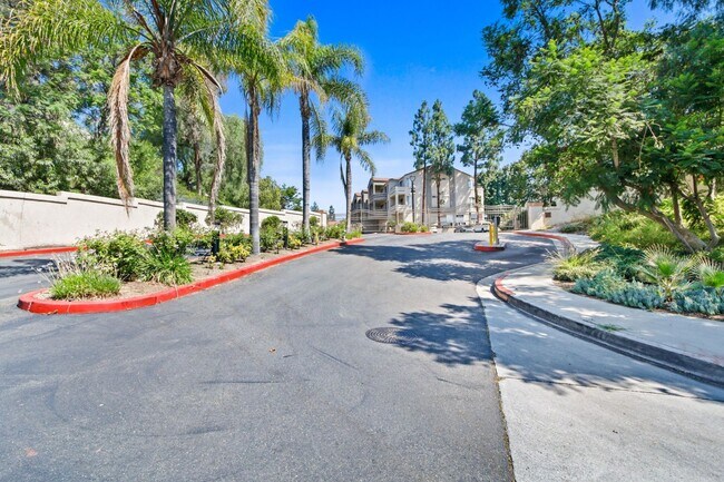 Photo - 1BR Condo with Private Balcony, Central A/C & Community Amenities in Corona