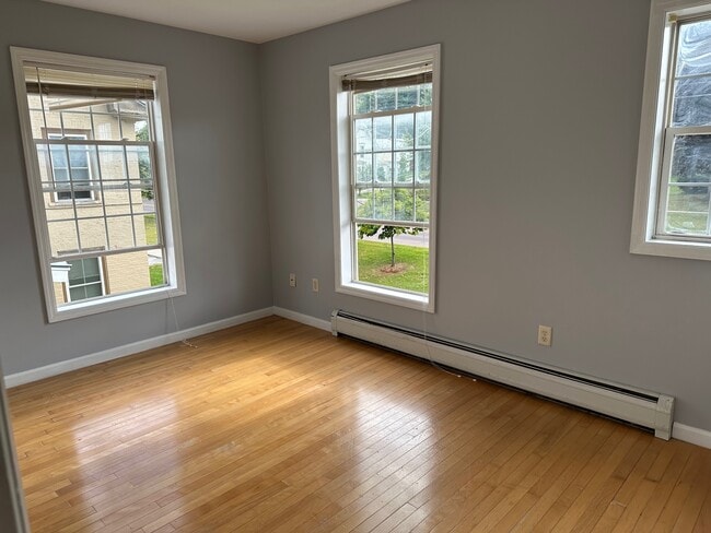 front bedroom with closet - 168 N Main St